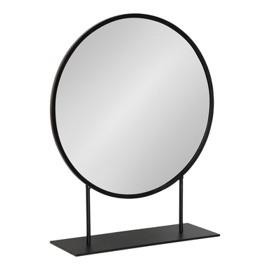A round tabletop mirror with a black metal frame, designed to be freestanding on a flat surface.