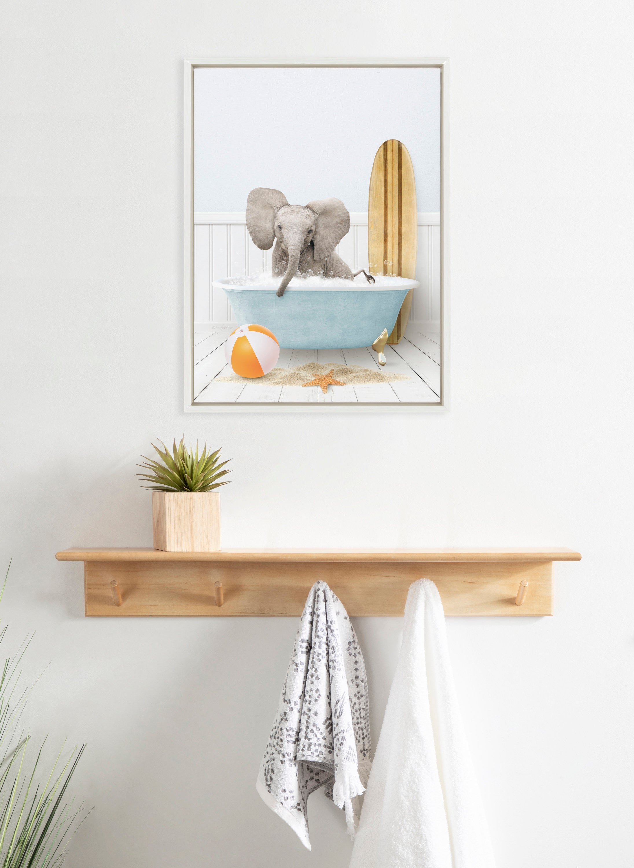 Sylvie Baby Elephant Beach House Bath with Surfboard Framed Canvas by Amy Peterson