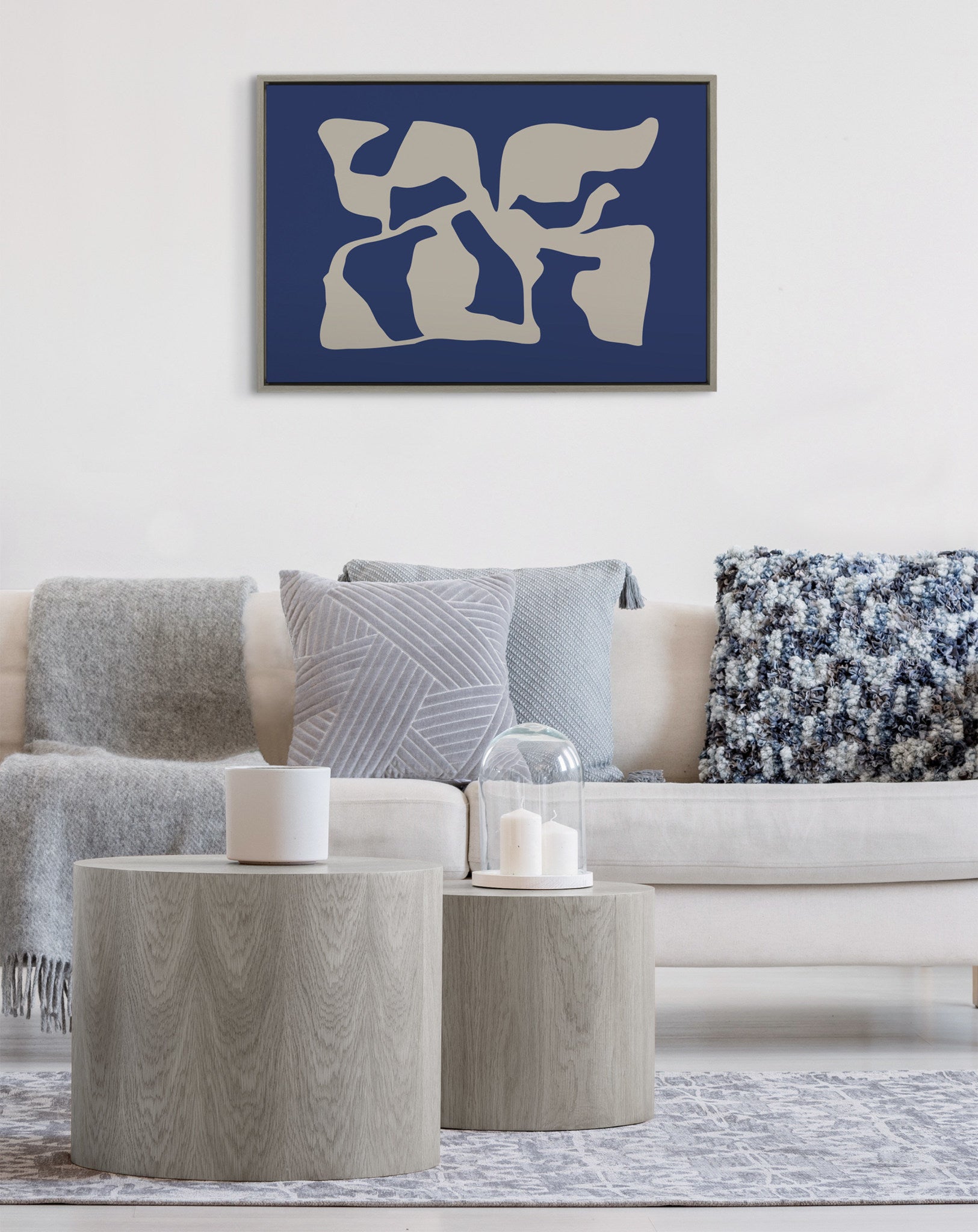 Sylvie Distorted Shapes of Blue and Tan Framed Canvas by The Creative Bunch Studio
