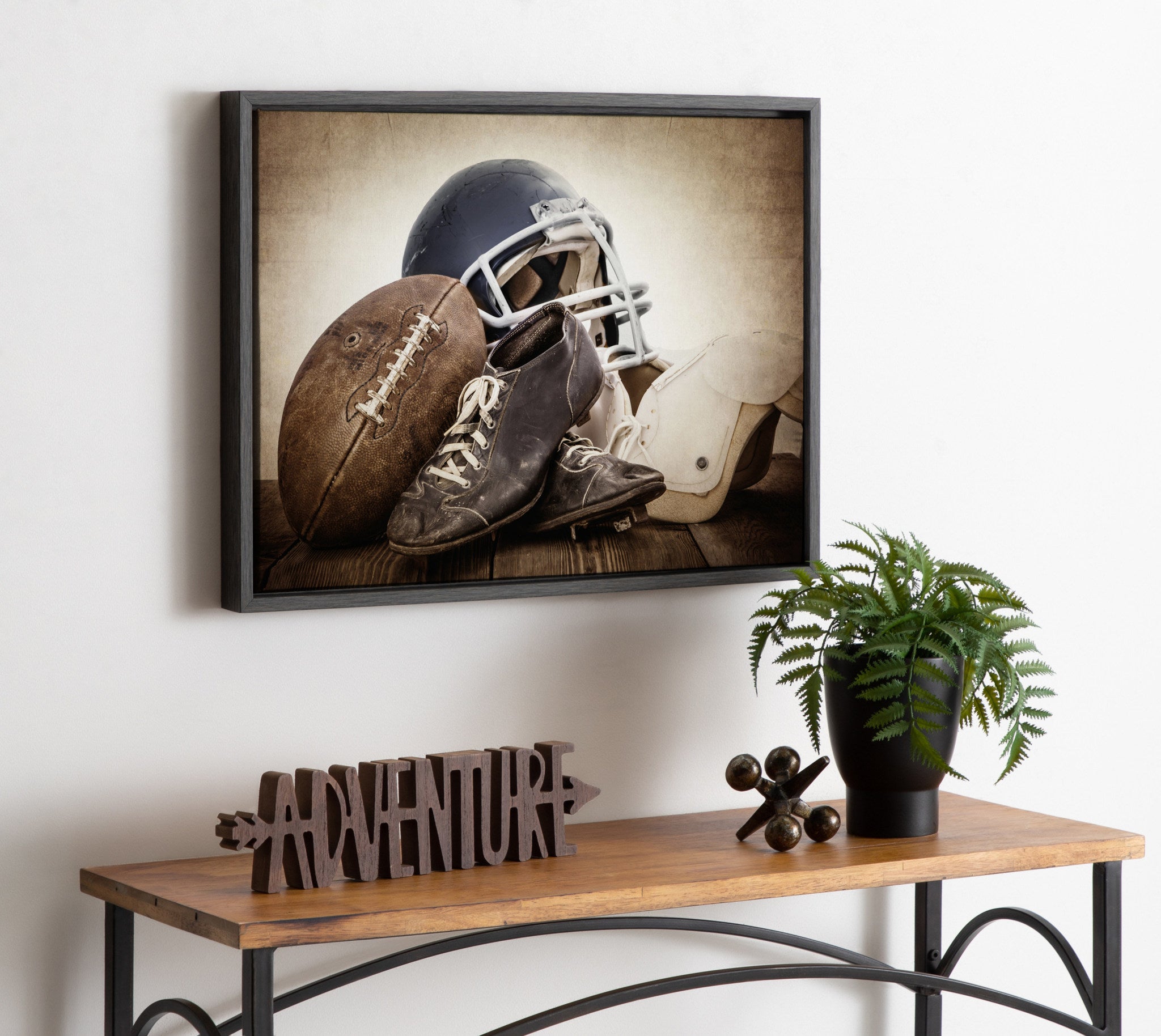 Sylvie Vintage Football Gear Framed Canvas by Shawn St. Peter