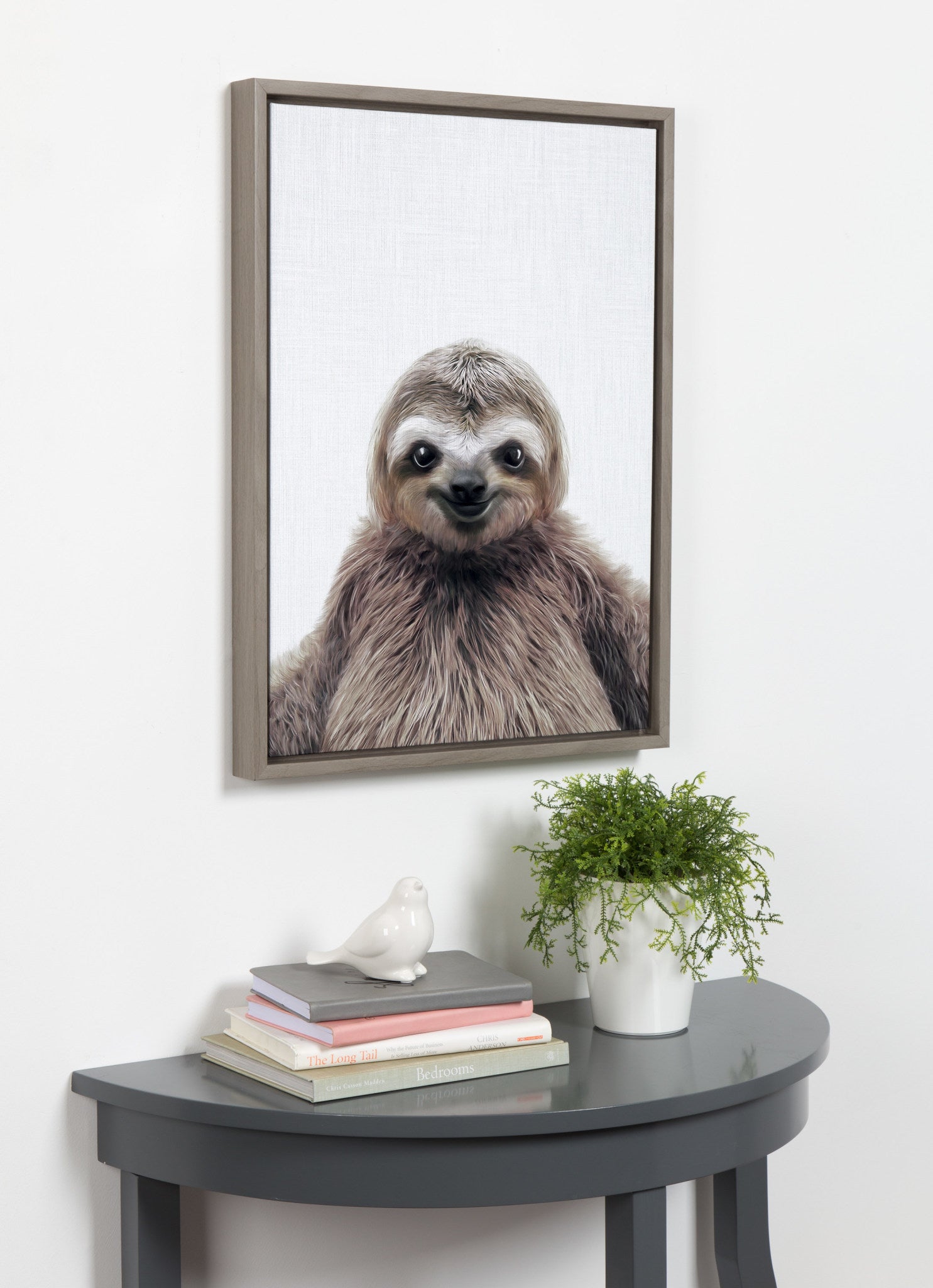 Sylvie Sloth Color Framed Canvas by Simon Te Tai