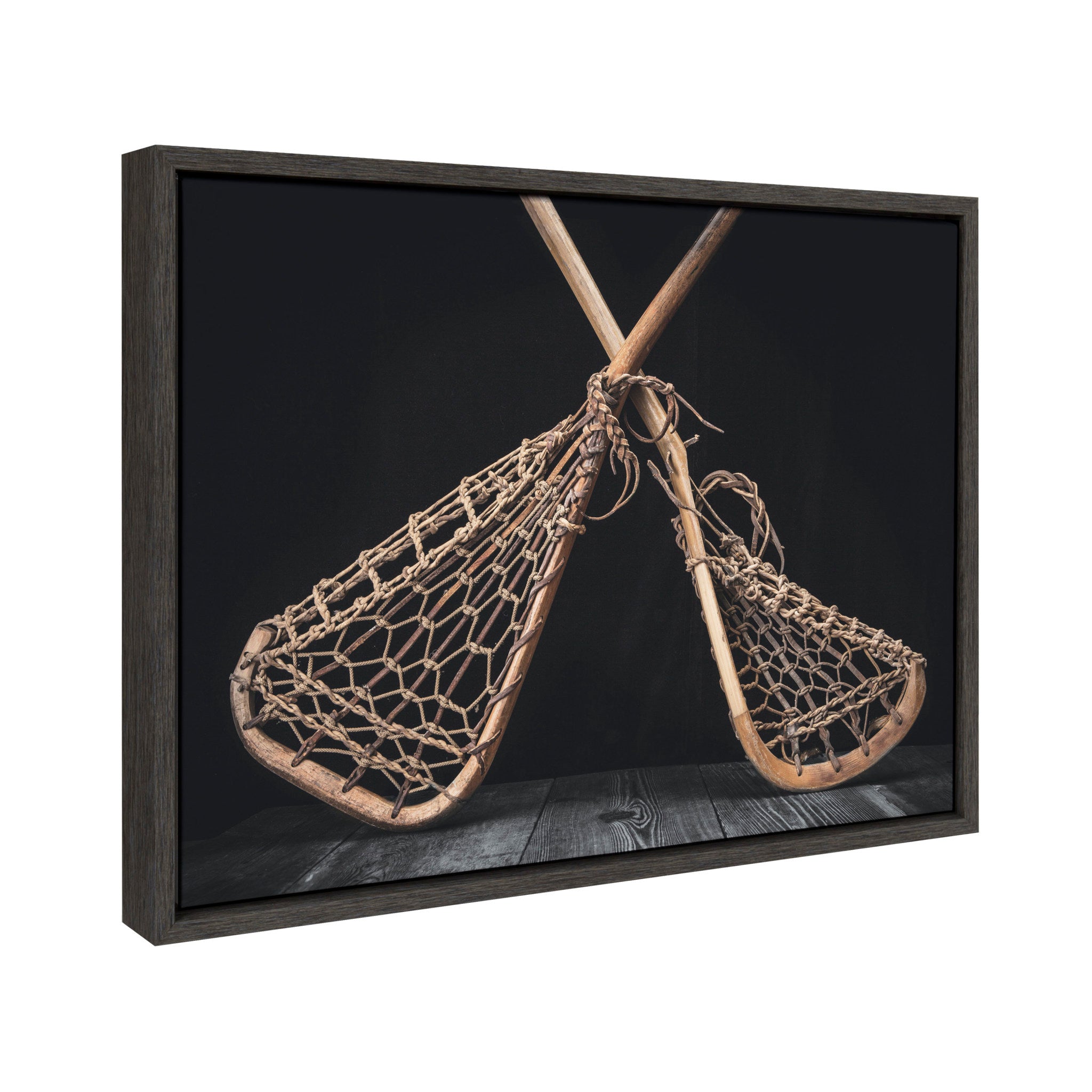 Sylvie Lacrosse Sticks Framed Canvas by Shawn St. Peter